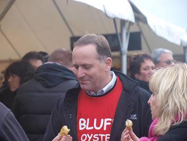 The PM enjoying the Bluff delicacy
